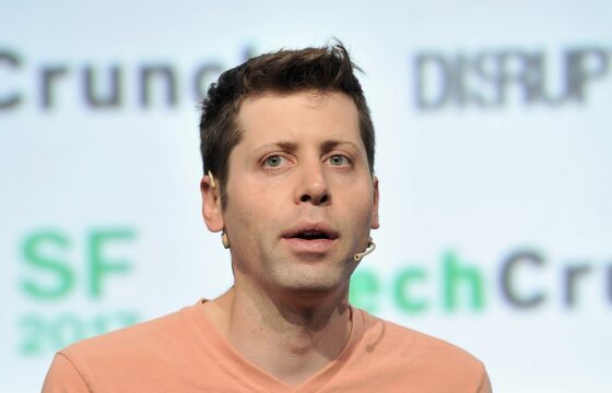 Sam Altman speaking at TechCrunch Disrupt in 2017